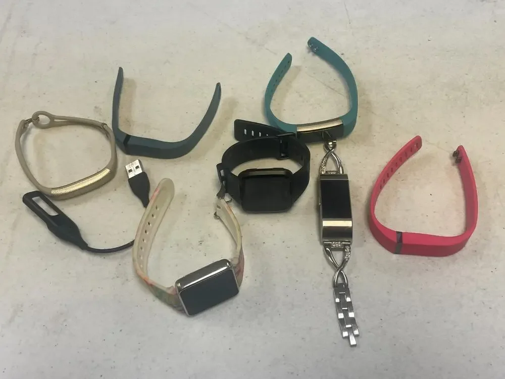 Lot of 7 Fitbit Mixed Brands Activity Tracker Smart Watches Untested For Parts